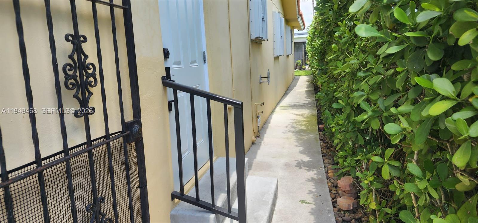 6265 Southwest 31st Street, Unit B Miami, FL 33155 - Photo 12 of 26 a view of a stairs of the house and trees