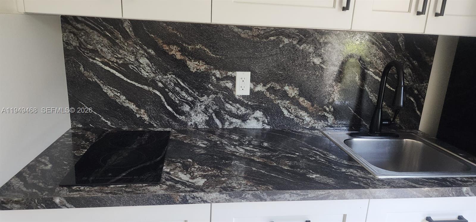 6265 Southwest 31st Street, Unit B Miami, FL 33155 - Photo 14 of 26 a close view of sink