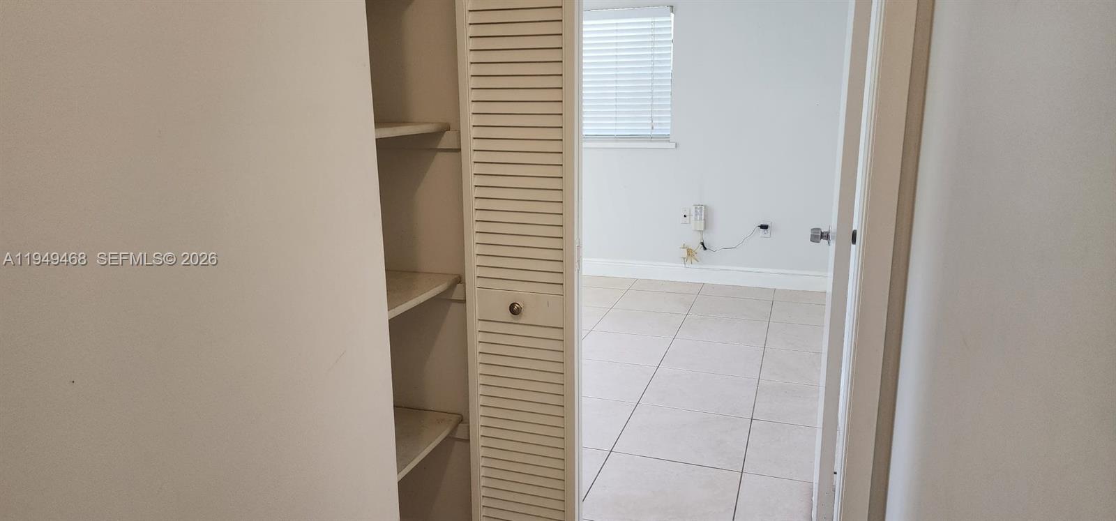 6265 Southwest 31st Street, Unit B Miami, FL 33155 - Photo 18 of 26 a bathroom with a bathtub