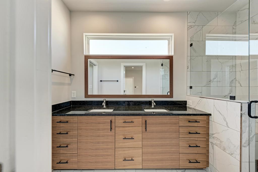 7714 Watson Street, Unit B Austin, TX 78757 - Photo 23 of 40 Master Bath w/black granite countertops