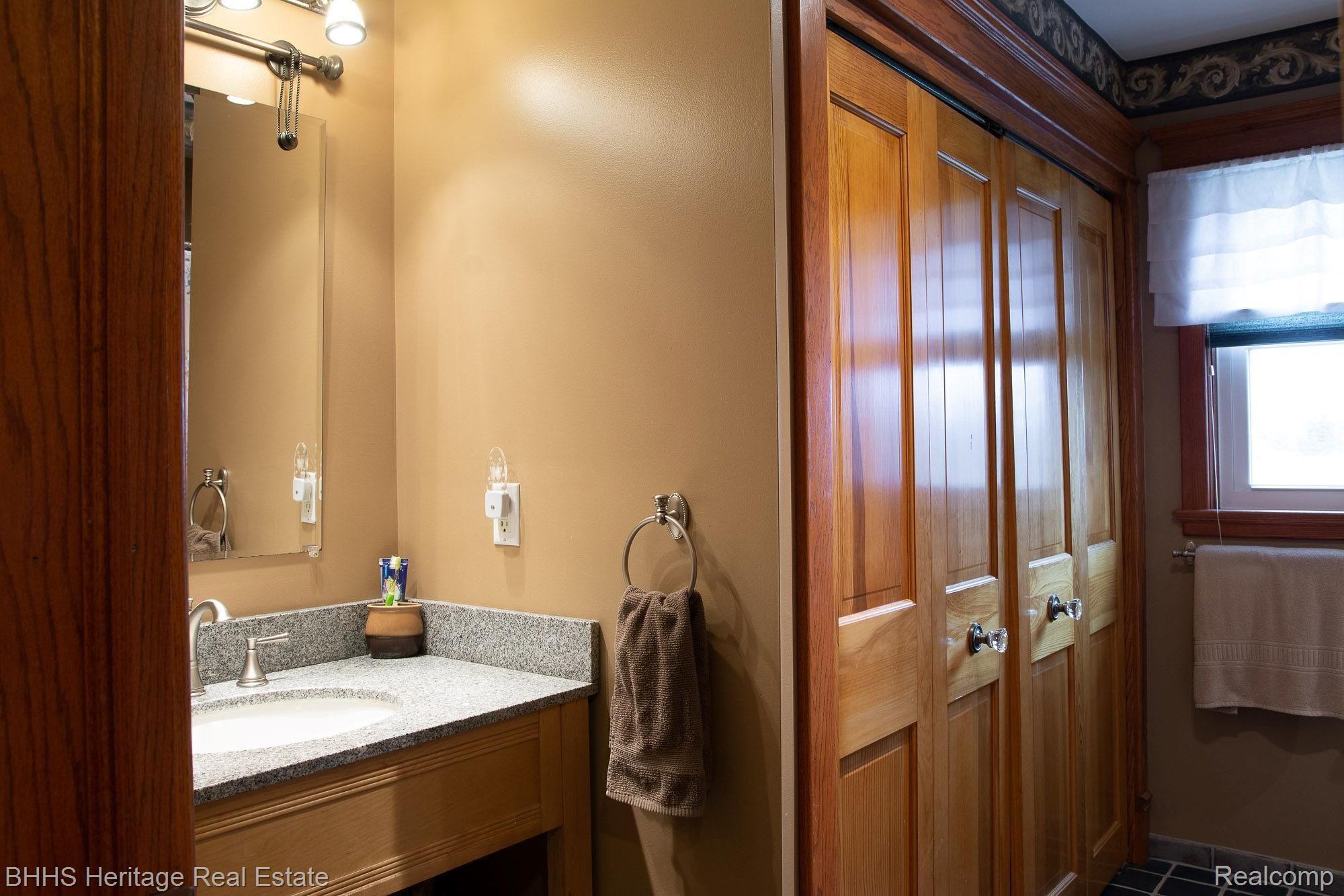 7942 West Allen Road Fowlerville, MI 48836 - Photo 20 of 68 1st floor bathroom