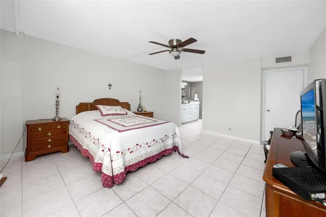 a view of walk in closet with clothes