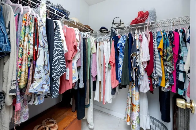 a spacious bathroom with a double vanity sink mirror and