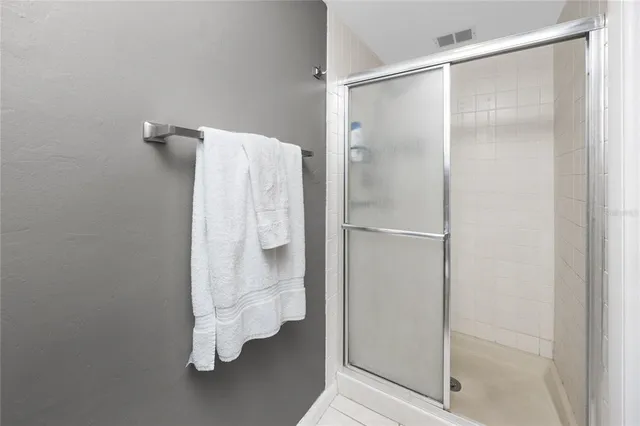 a bathroom with a sink toilet and a mirror