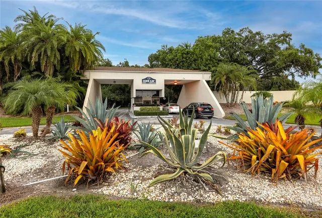 a view of a swimming pool with a yard