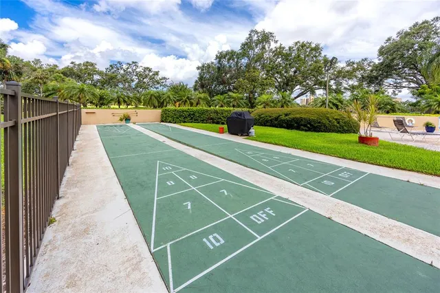 a view of swimming pool with lounge chair