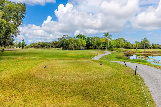 a table and chairs with the view of lake view