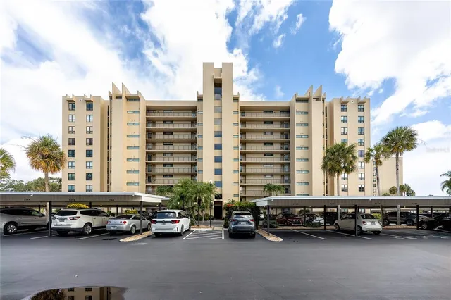 a view of a cars parked in front of a building