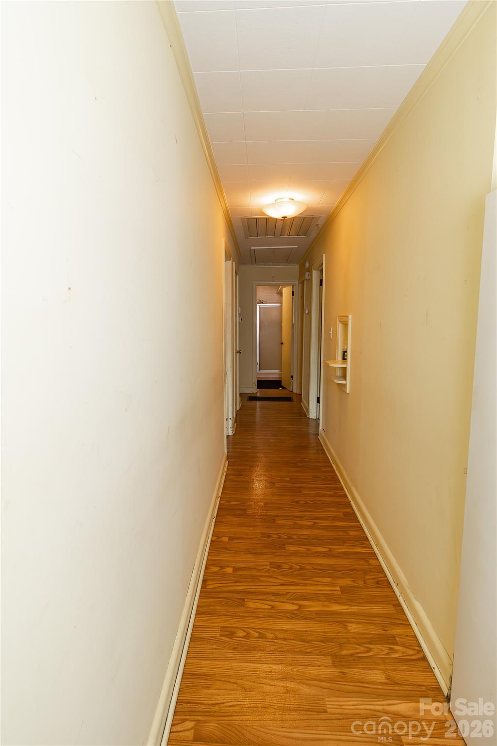 609 Wilcox Avenue Gaffney, SC 29341 - Photo 16 of 23 a view of a hallway with wooden floor