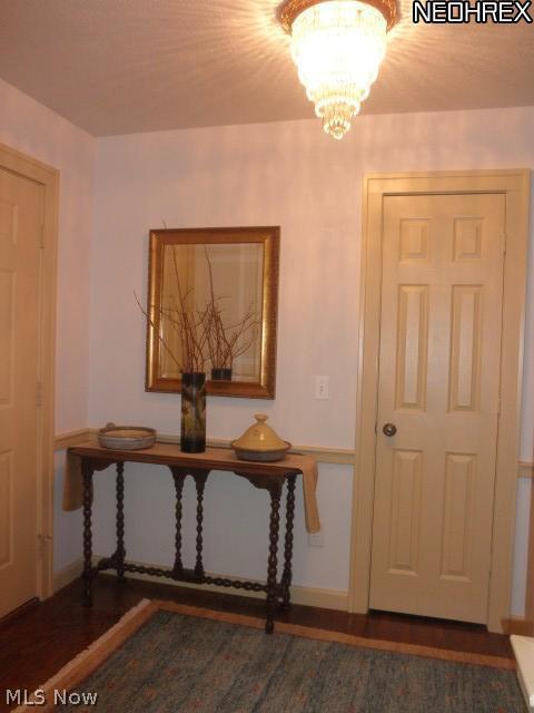 13405 Butler Road Wakeman, OH 44889 - Photo 5 of 25 Need a coat closet too? Don't worry, there's a space for that too! Notice the detail in the trim work, moldings and chair rail in this "newer" home made to look like a 19th century farmhouse.