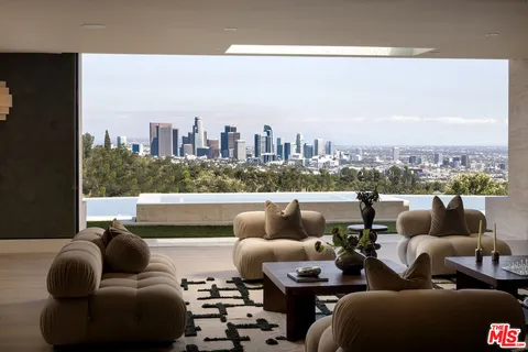 a view of roof with city view