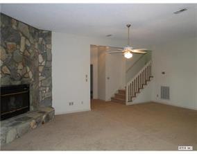 31005 Executive Point Tega Cay, SC 29708 - Photo 11 of 16 a view of a livingroom with a fireplace