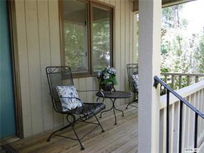 31005 Executive Point Tega Cay, SC 29708 - Photo 16 of 16 a balcony with chairs and a potted plant
