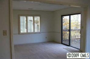 31005 Executive Point Tega Cay, SC 29708 - Photo 7 of 16 a view of an empty room with a window