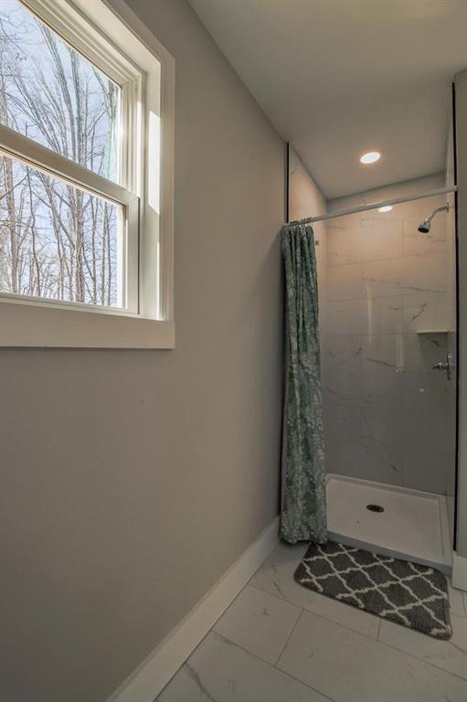 1020 Riverbend Road Commerce, GA 30530 - Photo 20 of 38 a bathroom with a shower