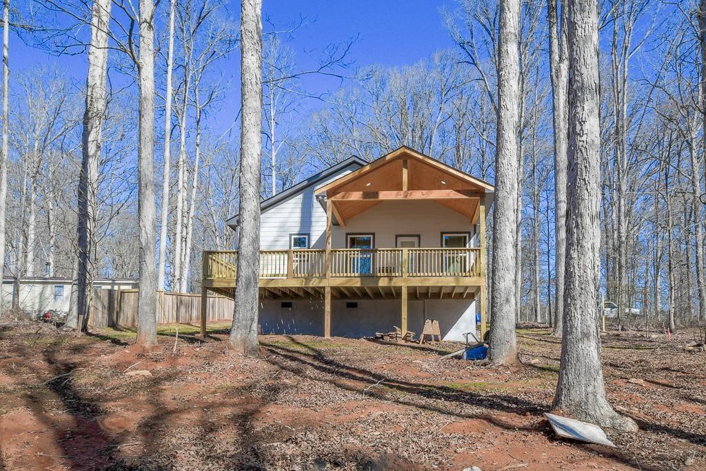 1020 Riverbend Road Commerce, GA 30530 - Photo 31 of 38 a front view of a house with a yard