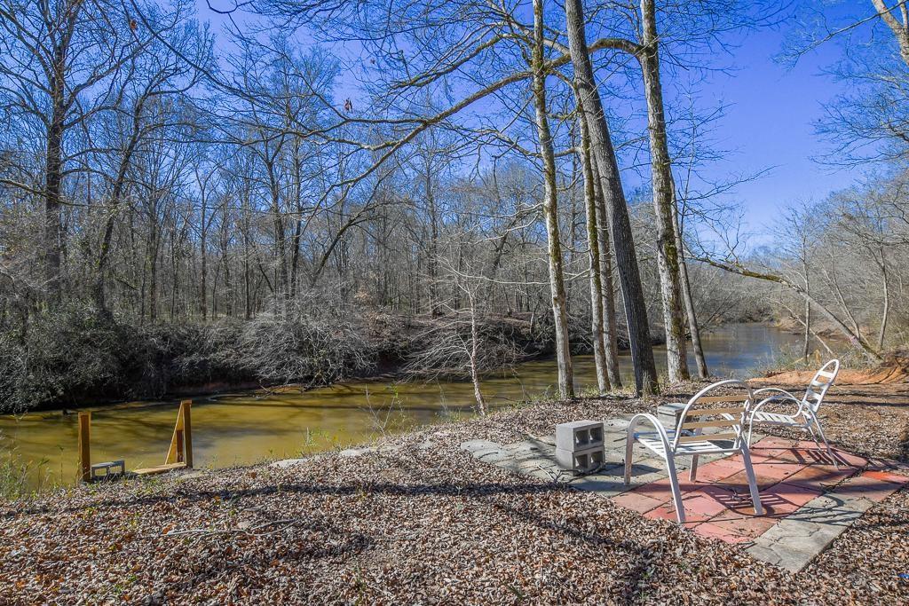 1020 Riverbend Road Commerce, GA 30530 - Photo 33 of 38 a view of a yard with swimming pool