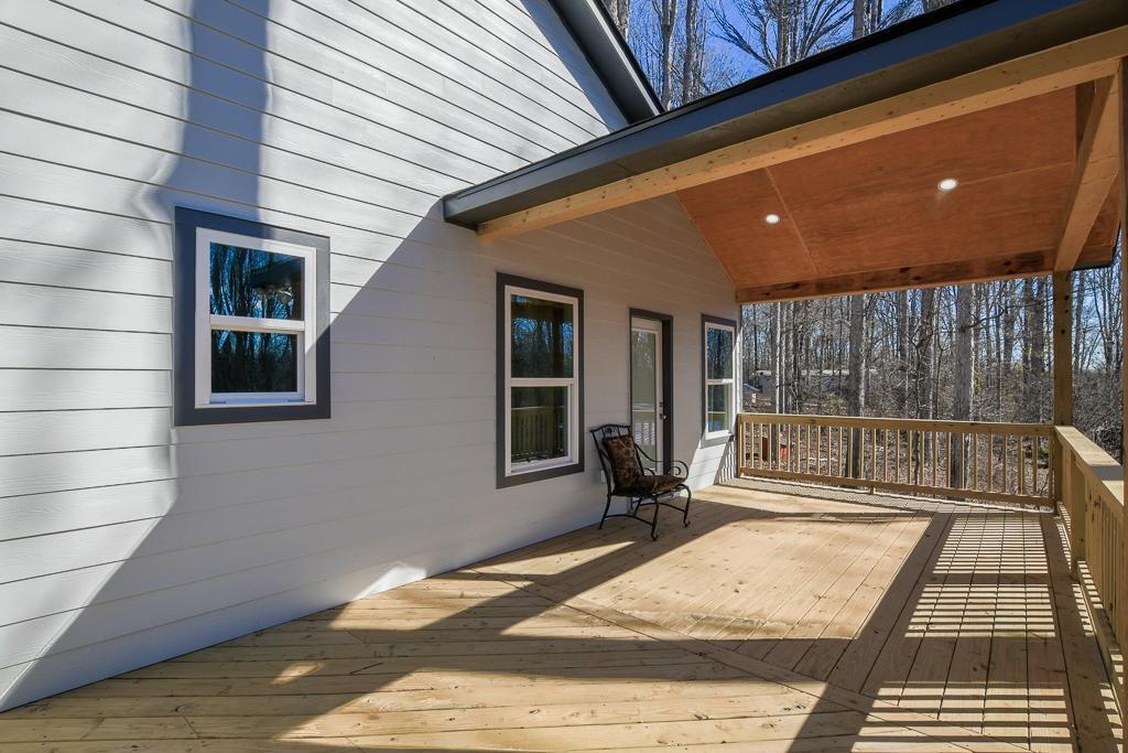 1020 Riverbend Road Commerce, GA 30530 - Photo 4 of 38 a balcony with a couch