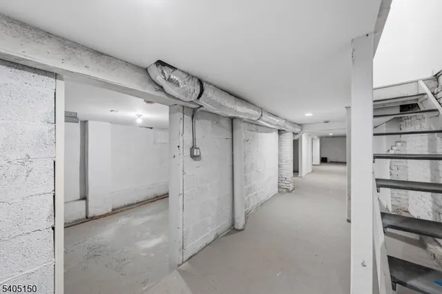 a view of hallway with walk in closet