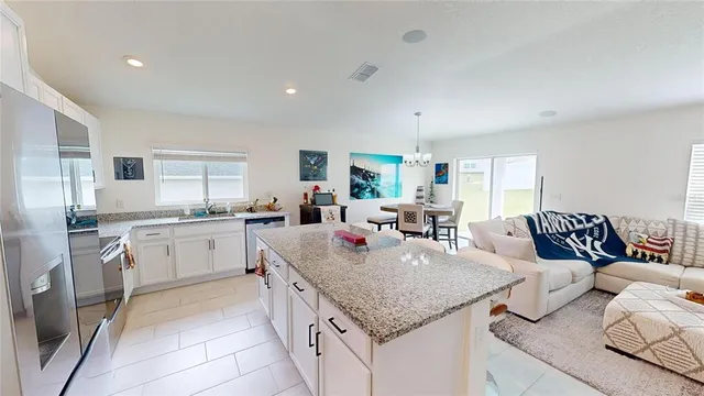 a kitchen with granite countertop lots of counter top space