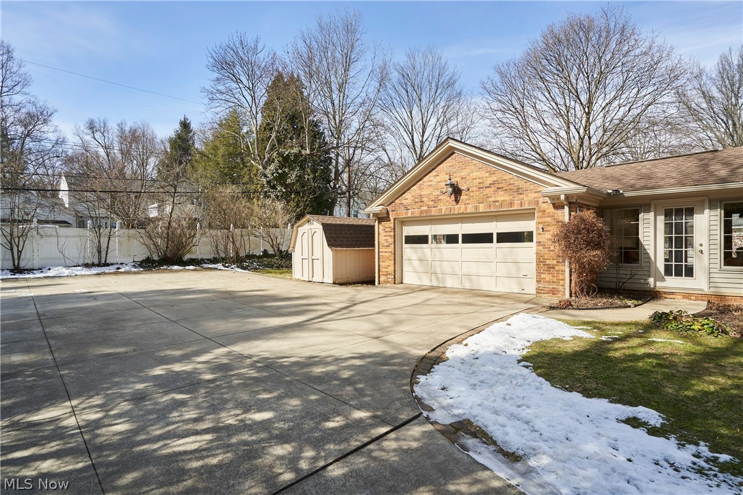 192 Durward Road Akron, OH 44313 - Photo 31 of 33 Side of structure including shed and 3 additional parking spots at end of driveway