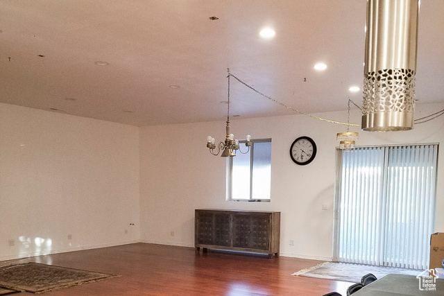 2855 South 1000 West Perry, UT 84302 - Photo 63 of 142 Unfurnished dining area featuring radiator, dark wood-style floors, a chandelier, and recessed lighting