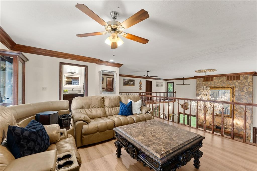 7215 Kelly Bridge Road Dawsonville, GA 30534 - Photo 27 of 87 a living room with furniture and a table