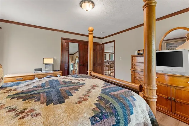 a view of a house with backyard porch and sitting area