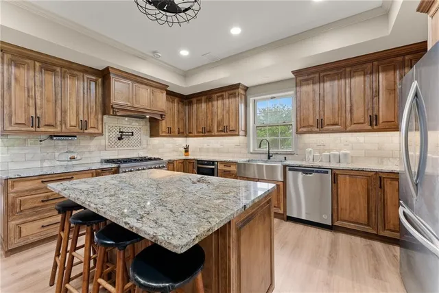 a view of a park with a bench and trees