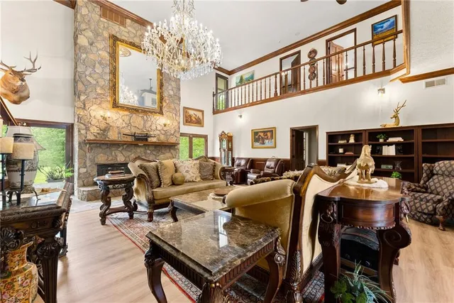 a bed room with a bed and a large window