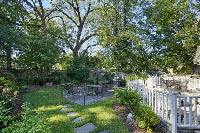 a garden view with a seating space