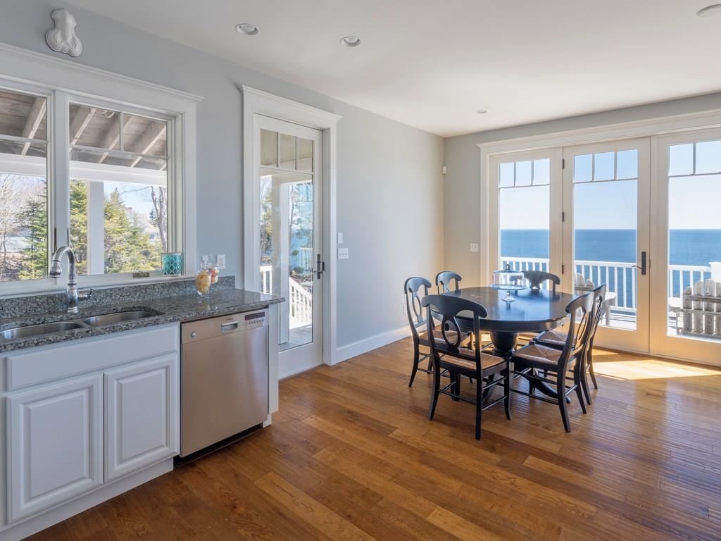 38 Yellow Head Road New Harbor, ME 04554 - Photo 14 of 35 Dining area with doors to porch and deck
