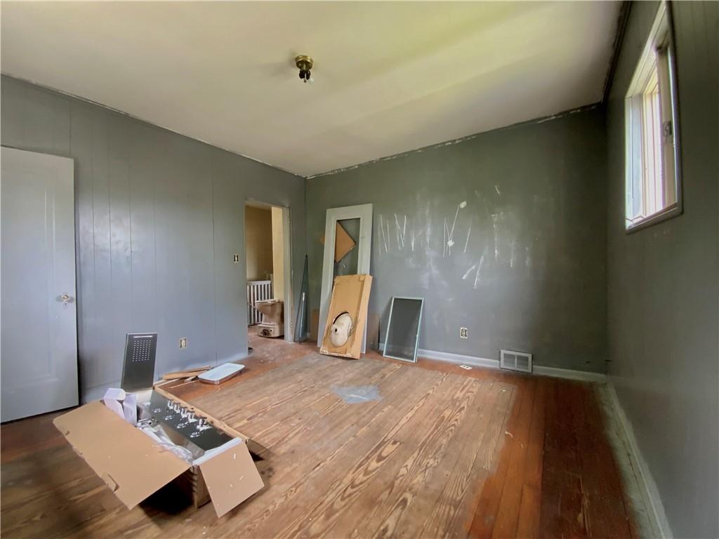 1109 Progress Street McKees Rocks, PA 15136 - Photo 14 of 30 a view of an empty room and wooden floor