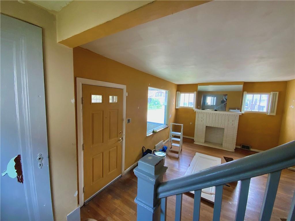 1109 Progress Street McKees Rocks, PA 15136 - Photo 19 of 30 a view of a workspace with furniture and wooden floor