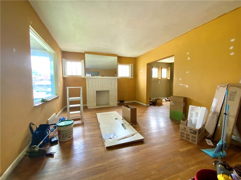 1109 Progress Street McKees Rocks, PA 15136 - Photo 20 of 30 a living room with furniture hard wood floor and a large window