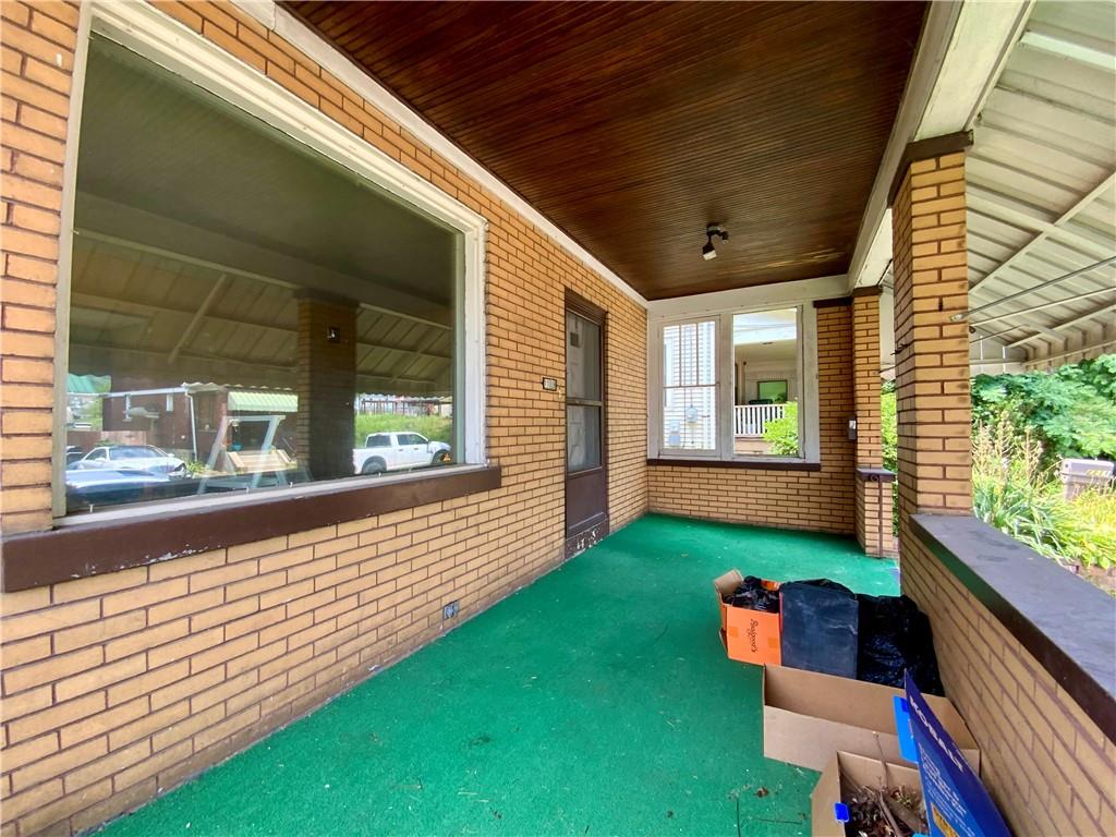 1109 Progress Street McKees Rocks, PA 15136 - Photo 26 of 30 a front view of a house with garden