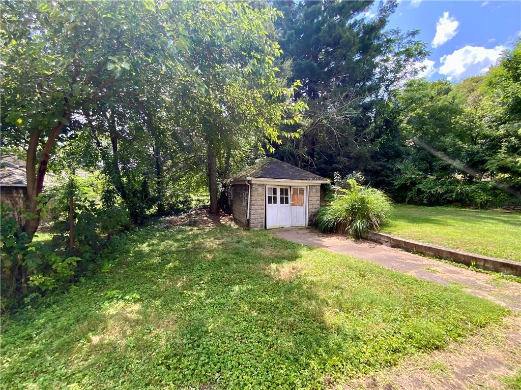 1109 Progress Street McKees Rocks, PA 15136 - Photo 29 of 30 a fire hydrant in the middle of a field