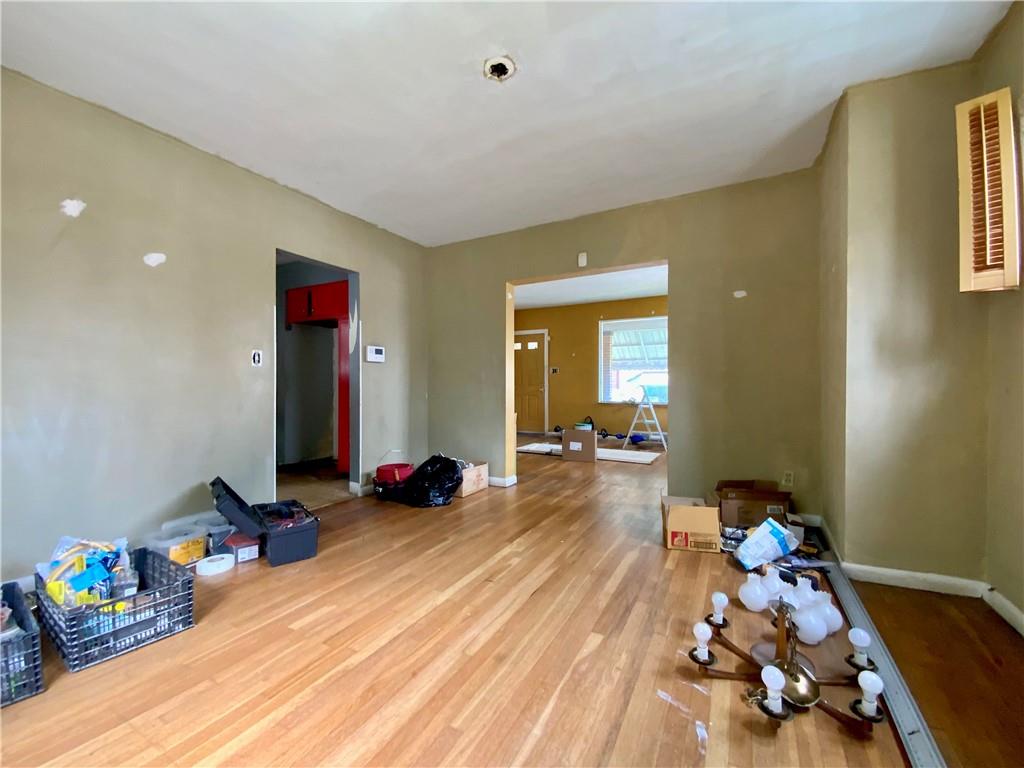 1109 Progress Street McKees Rocks, PA 15136 - Photo 4 of 30 a playing room with toys and wooden floor