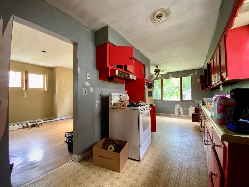 1109 Progress Street McKees Rocks, PA 15136 - Photo 8 of 30 a living room with furniture and a flat screen tv