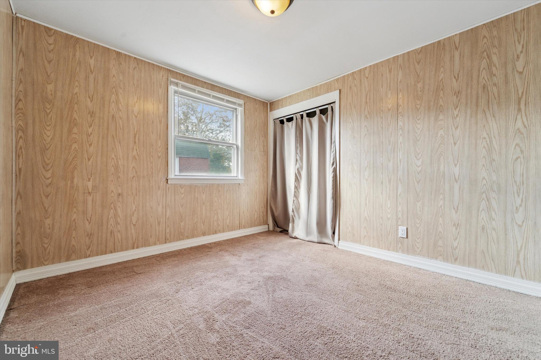 732 East 25th Street Chester, PA 19013 - Photo 15 of 25 an empty room with windows