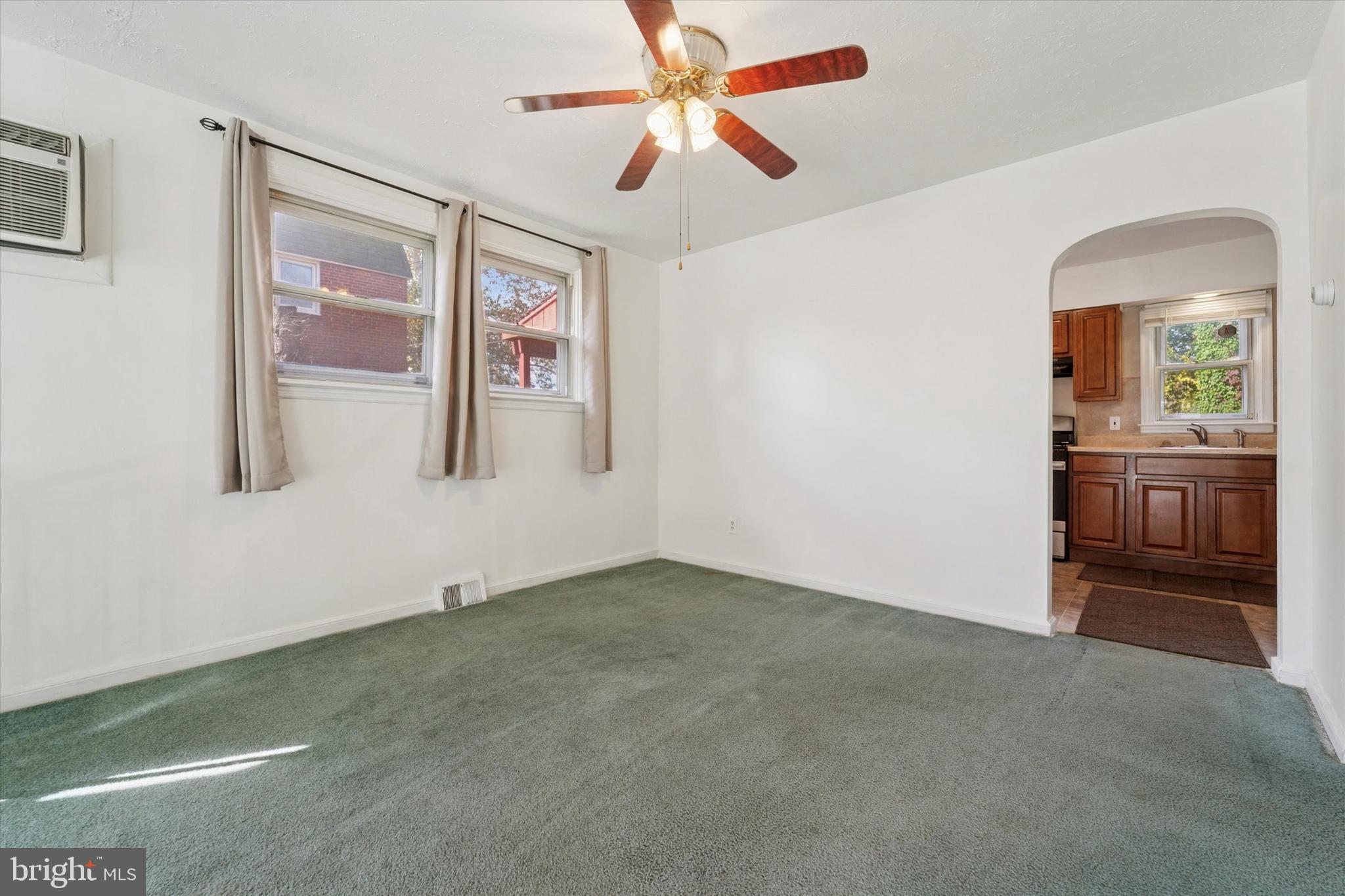 732 East 25th Street Chester, PA 19013 - Photo 6 of 25 a view of an empty room with a window