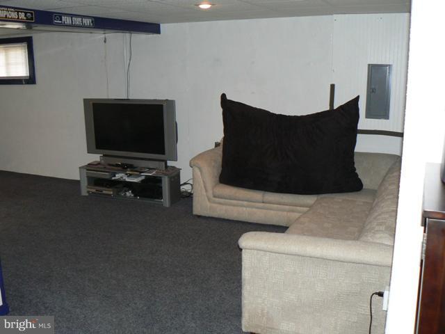 1739 Canal Run Drive Point of Rocks, MD 21777 - Photo 13 of 30 a living room with furniture and a flat screen tv