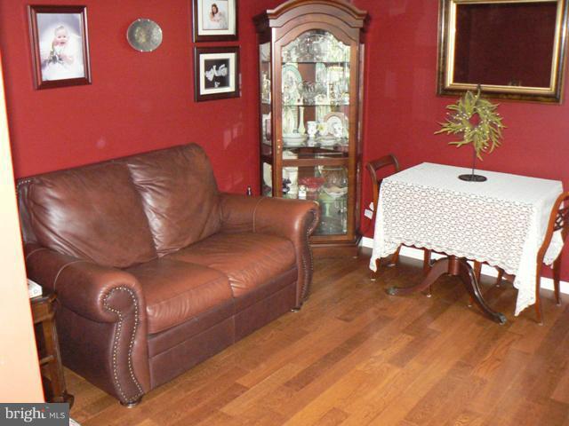 1739 Canal Run Drive Point of Rocks, MD 21777 - Photo 21 of 30 a living room with furniture and a wooden floor