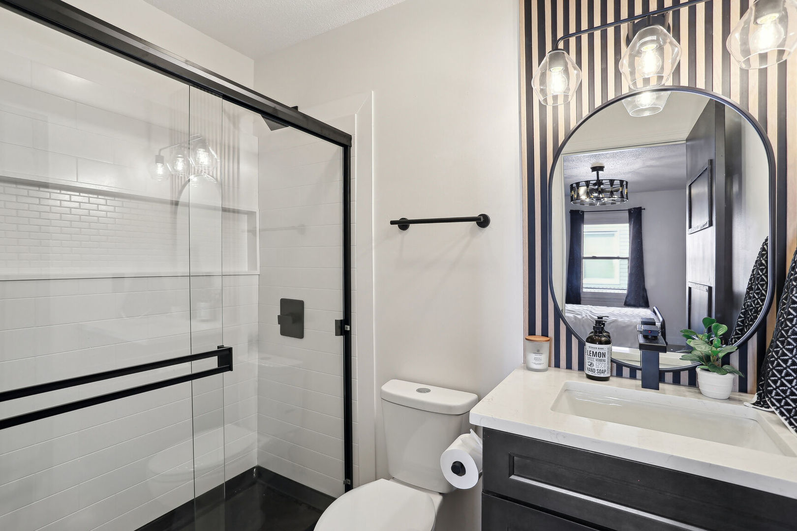 1817 Sadler Drive Champaign, IL 61821 - Photo 17 of 29 a bathroom with a sink a toilet a mirror and shower