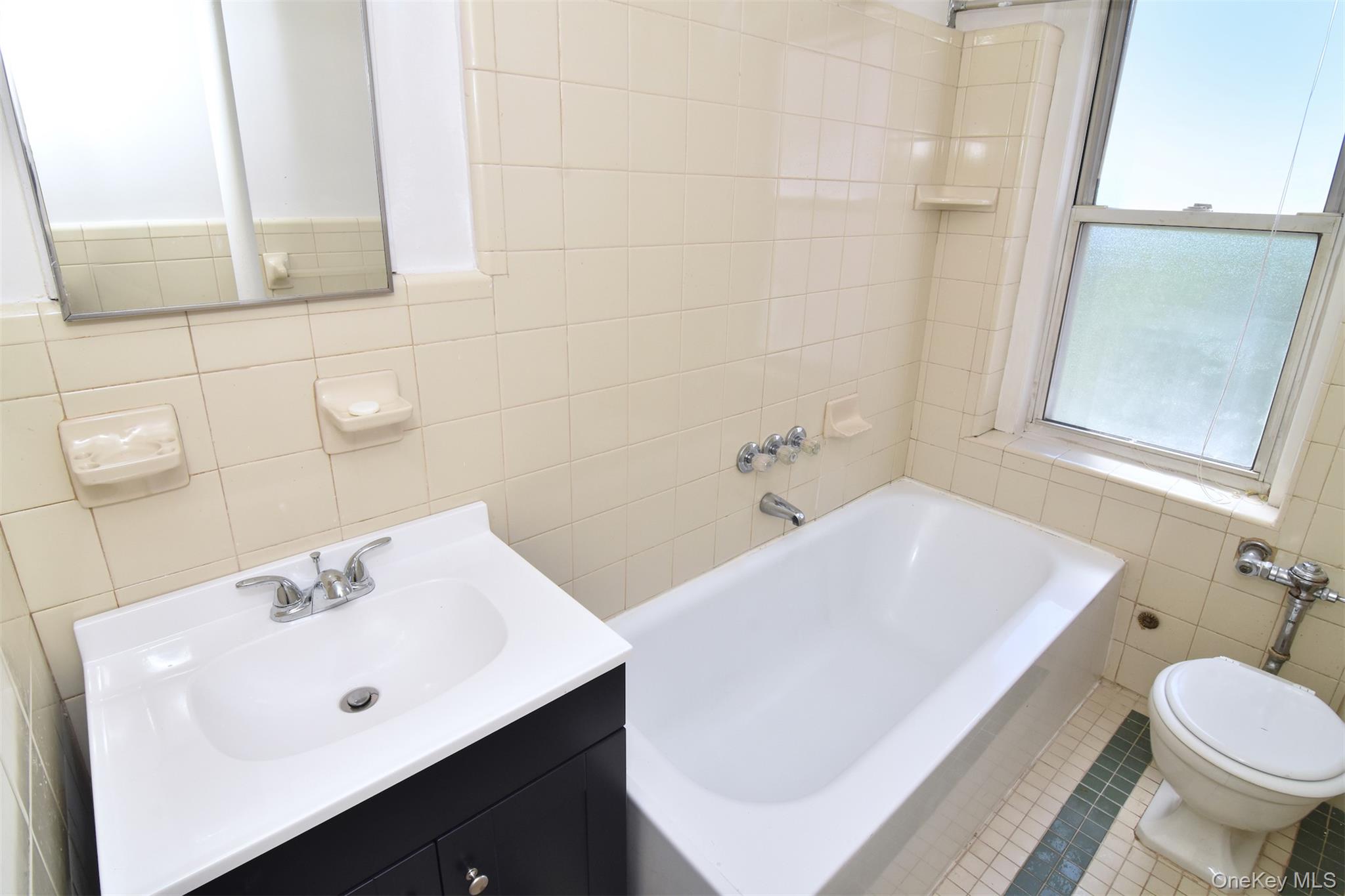 280 Bronxville Road, Unit 5W Bronxville, NY 10708 - Photo 11 of 14 A full bath with a new vanity completes the apartment's inviting interior.