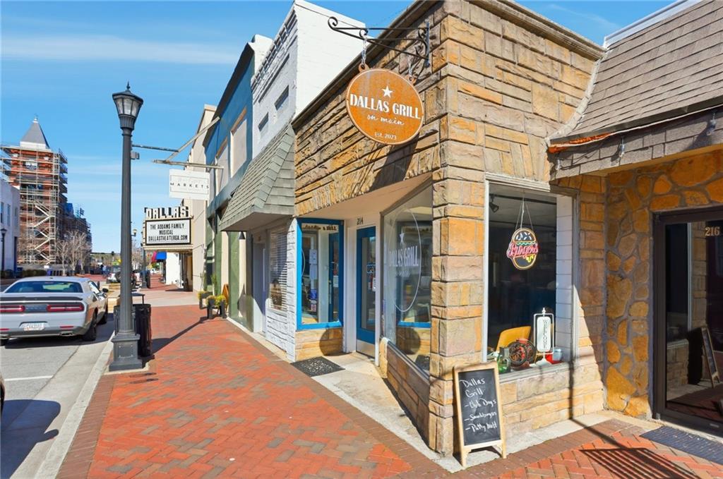 5.130 Acres On Orlando Path Dallas, GA 30157 - Photo 15 of 17 a view of a building with car parked