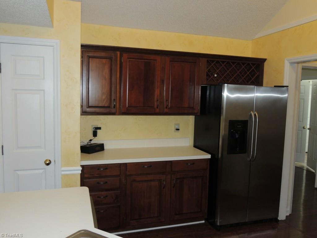 3326 Timberwolf Avenue High Point, NC 27265 - Photo 14 of 25 Kitchen features a pantry and wine storage area. Refrigerator remains!!