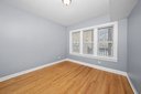 543 East 77th Street, Unit 2 Chicago, IL 60619 - Photo 5 of 6 a view of an empty room with a window