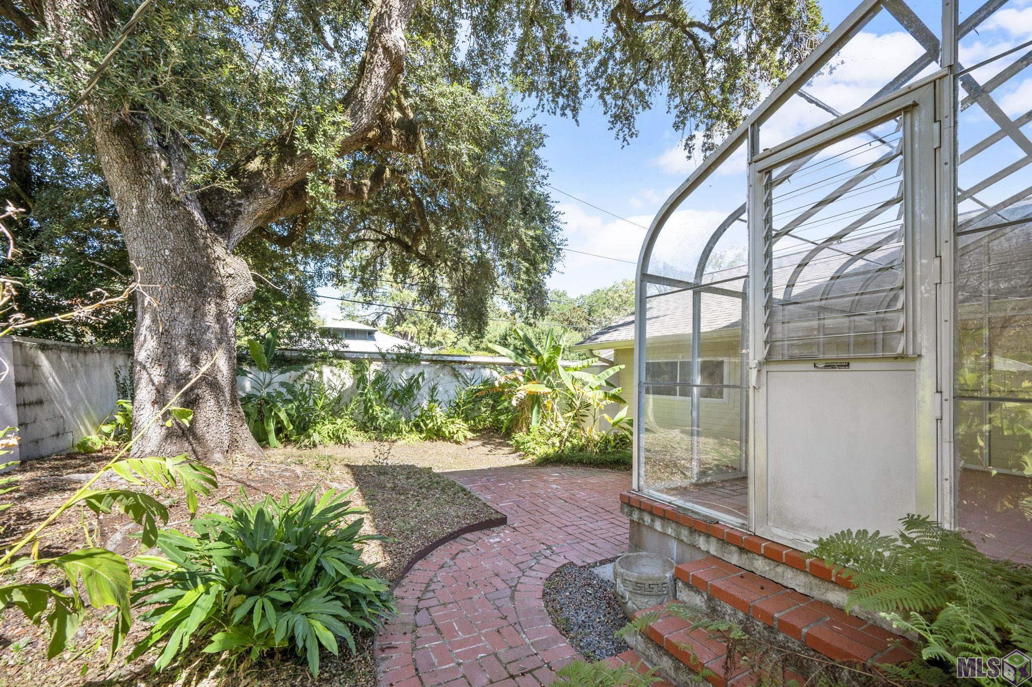 2247 Oleander Street Baton Rouge, LA 70806 - Photo 38 of 43 Backyard w/ greenhouse