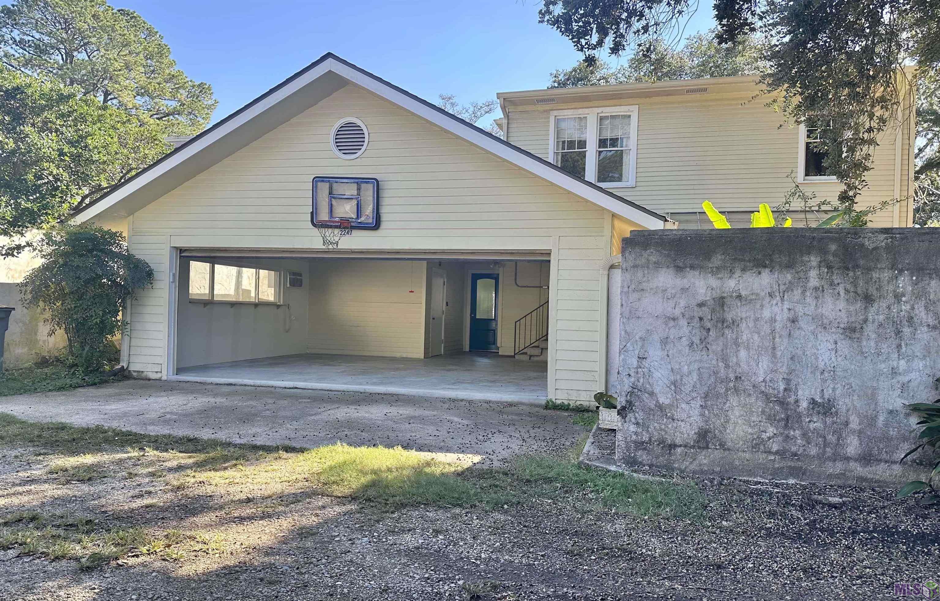 2247 Oleander Street Baton Rouge, LA 70806 - Photo 42 of 43 2 Car Garage w/ parking pad (view from alley)